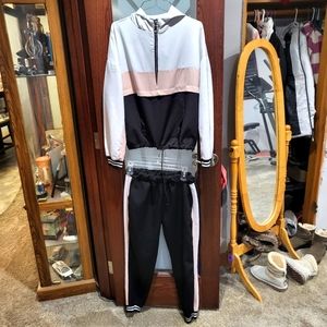 Womens 2 peice lounge suite.  Top is med to large. Pants, elastic waiste, sm/ m